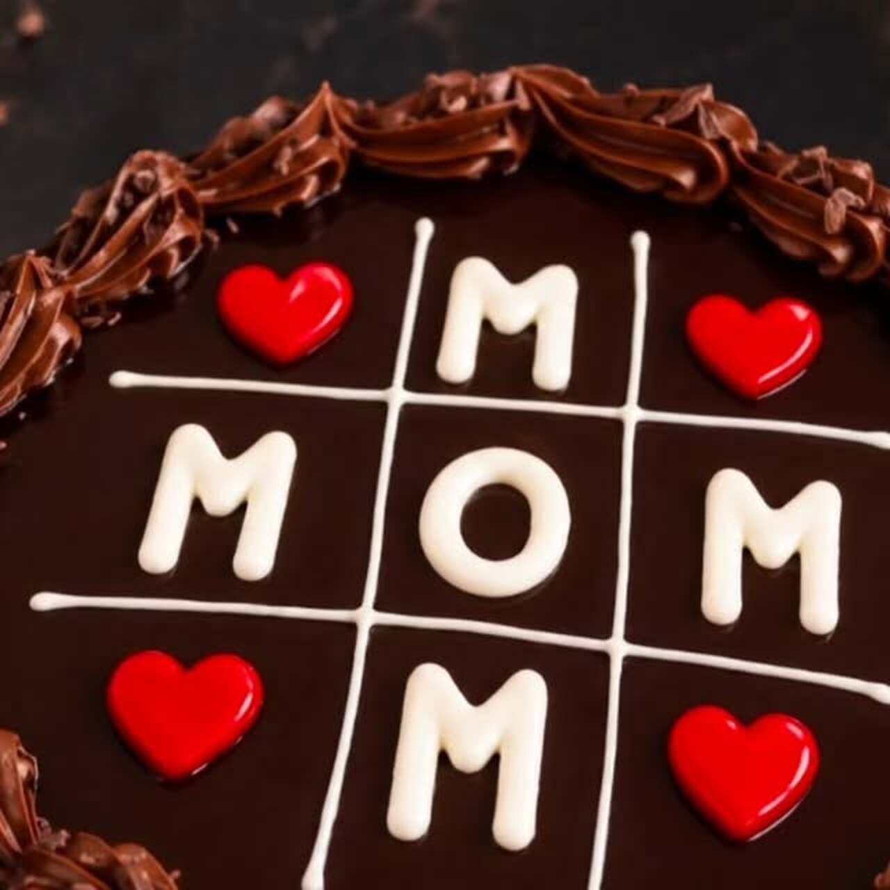 Chocolate cake with MOM tic-tac-toe design and red hearts